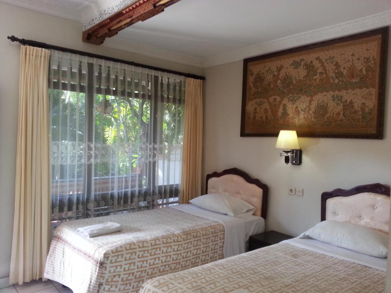 Dewa Bharata Bungalows Legian Værelse billede